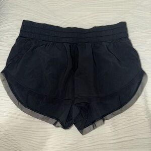 Lululemon vintage shorts black in size 8!! Have a fun sheet trim on the edges!!